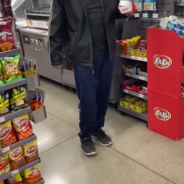 Drunk Gas Station Worker Tries To Moonwalk