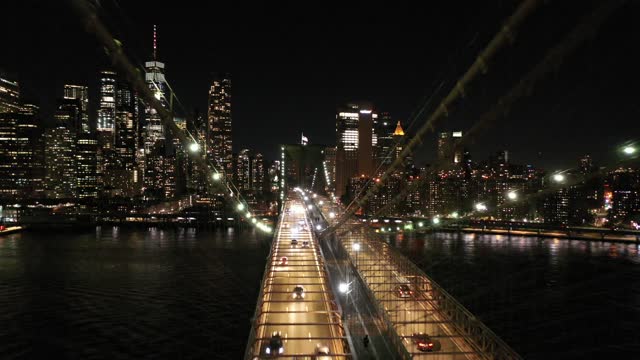 An amazing view of a bridge seen at night