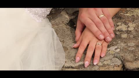 Engaged Couple Holding Hands