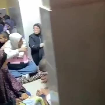 Patients and displaced civilians inside Al Nasr Hospital in northern Gaza