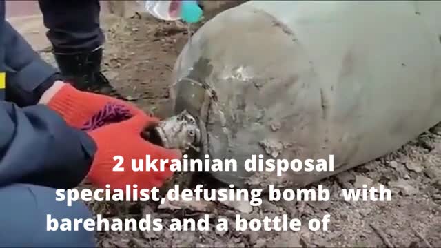 2 Ukrainian Disposal Specialist Defusing a Bomb