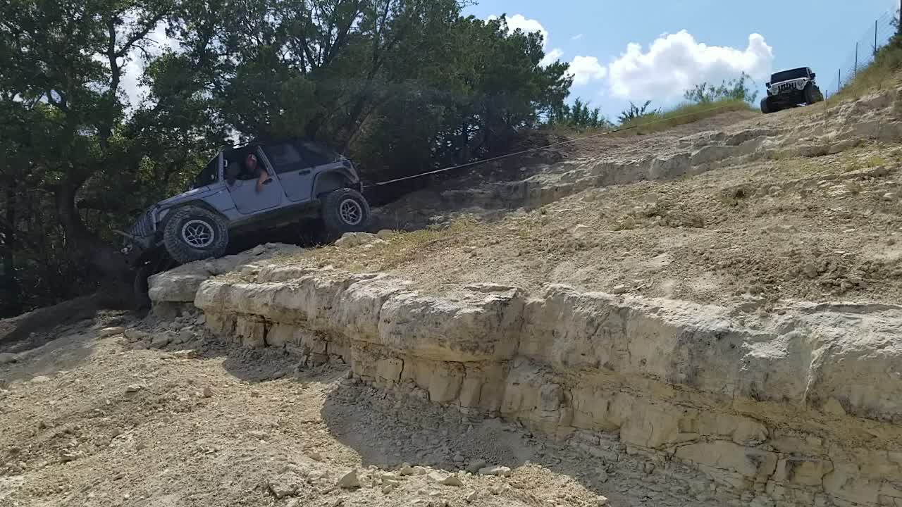 Jeep on a winch to save it from going over