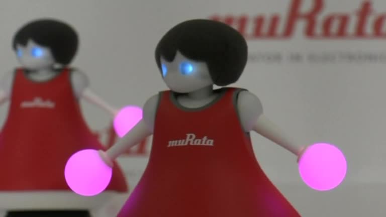 Japanese company unveils robot cheerleaders