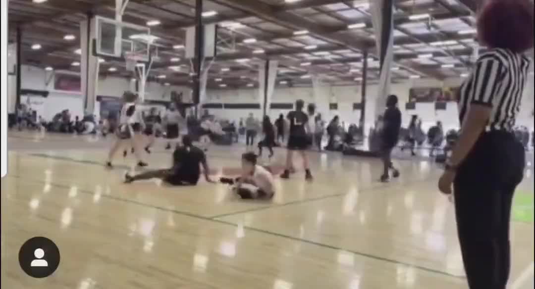 Mother charged for allegedly telling daughter to attack other player
