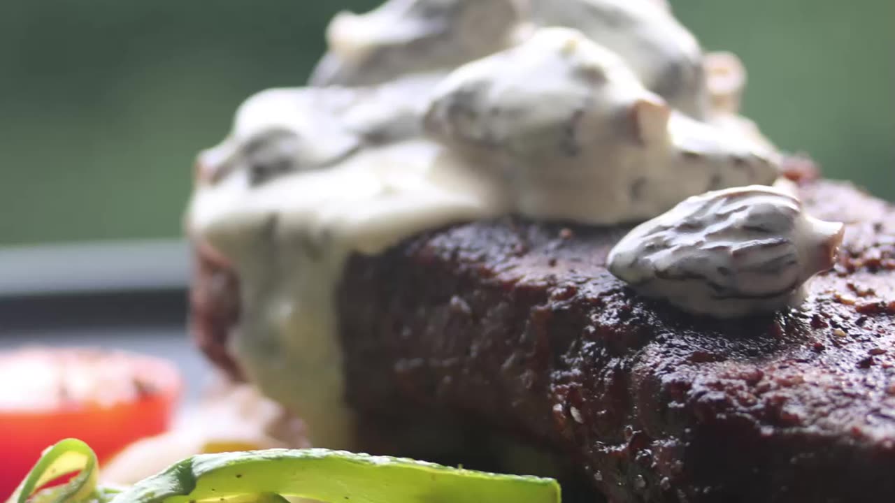 Strip Steak with Morel Cream Sauce and Shaved Asparagus