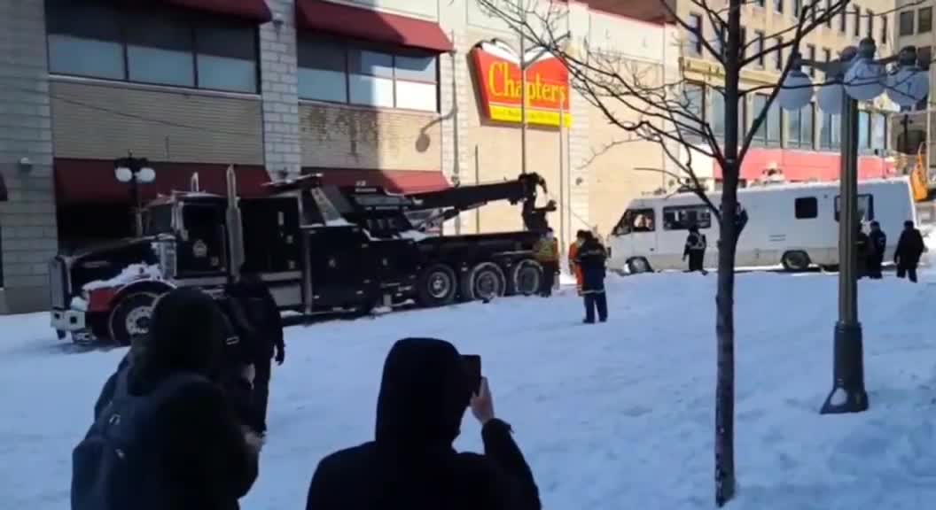 The RV they smashed their way into is being dragged