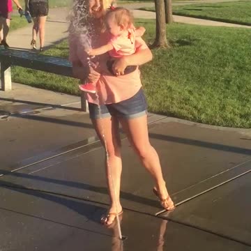 Mom and Daughter At Splashpad