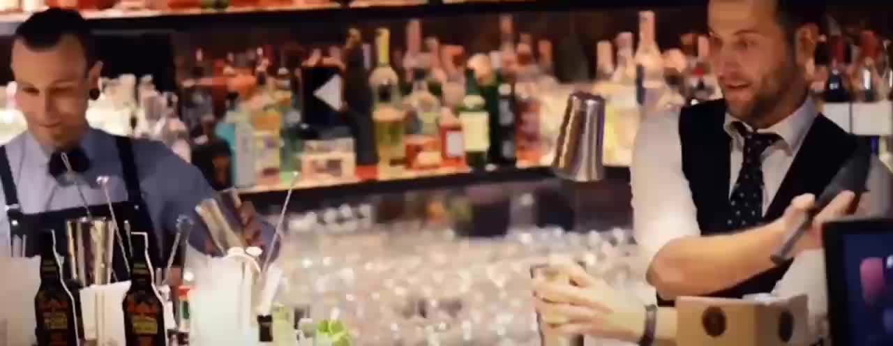 Watch the bartender show off his skills