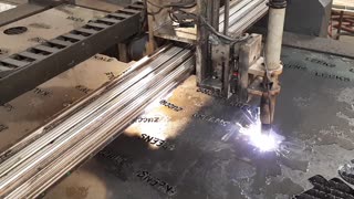 Plasma Cutter Cutting Shapes and Words in Metal