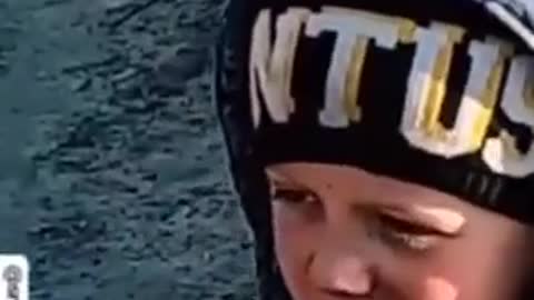 Russian troops provide hungry Ukrainian child with one of their ration packs
