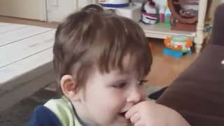 Little boy singing badly