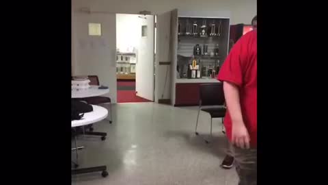 Two big guys red shirt high kick