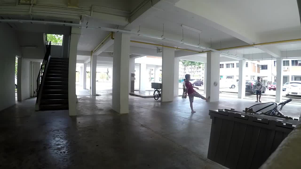 White garage soccer kick to face