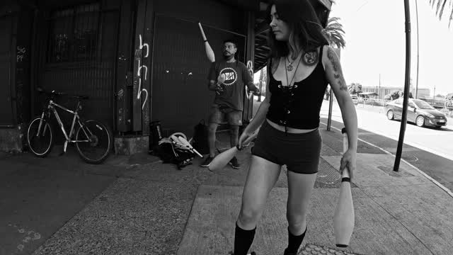 Street juggling on unicycles!!