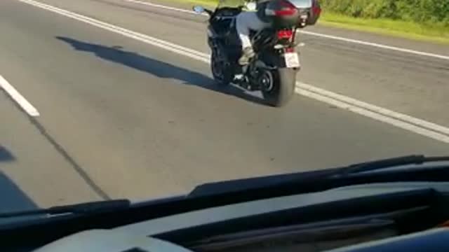 Motorcyclist Uses Ropes for Reins on His Ride