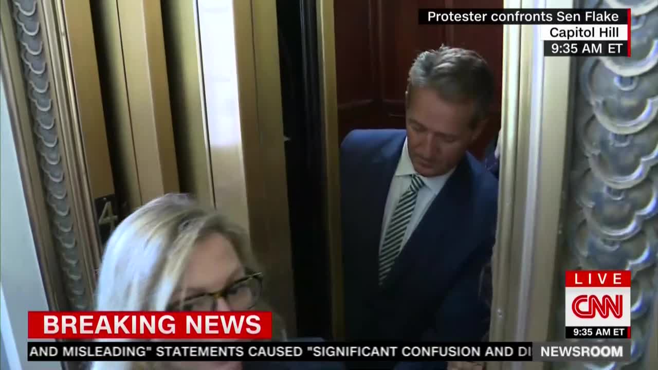 Sen. Flake confronted by protesters after announcing vote for Kavanaugh