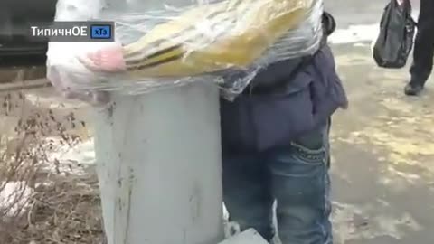 Ukraine: man tied to pole