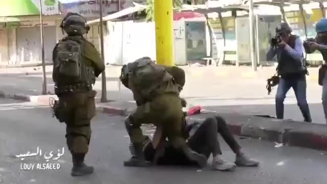 Israeli forces brutally assault and detain a Palestinian