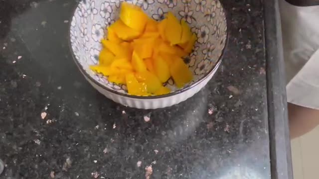 Cut the mango into pieces