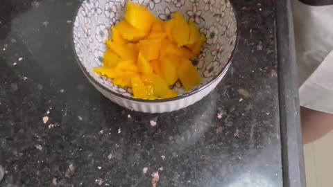 Cut the mango into pieces