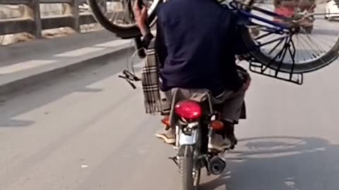 Respect man.... jugaad on bike