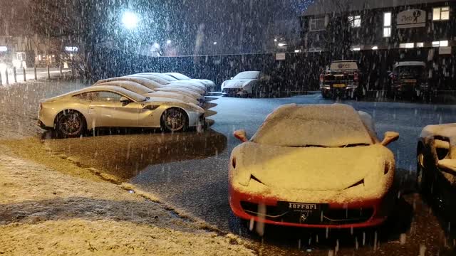 Snow Parking full by Ferrari cars