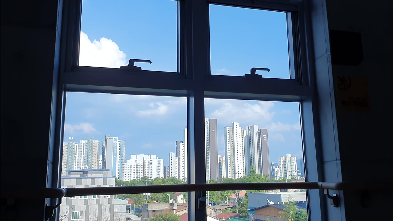 a view of the city in a large window