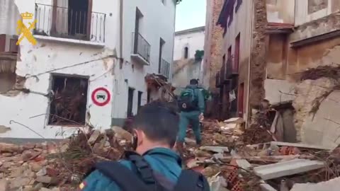 At least 64 people have died in eastern Spain after flash floods swept away cars