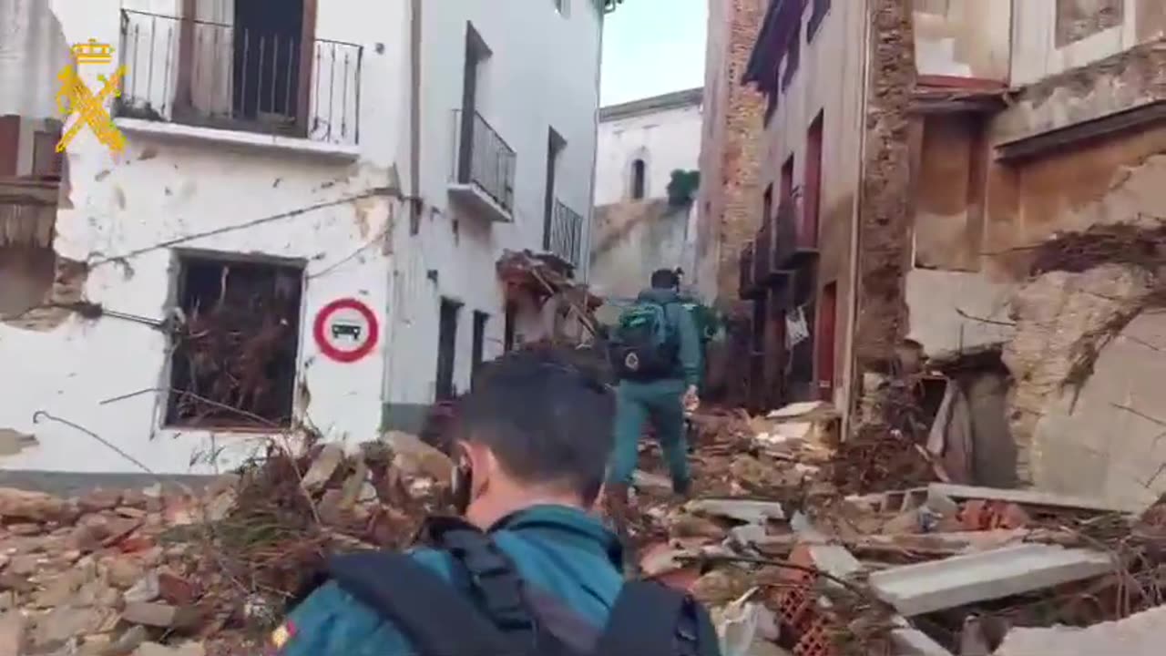 At least 64 people have died in eastern Spain after flash floods swept away cars