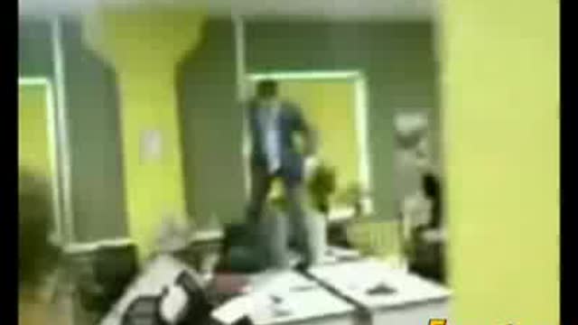 Better Footage of the Man Going Berserk in an Office