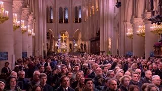 Bells ring through Paris as Notre Dame re-opens its doors