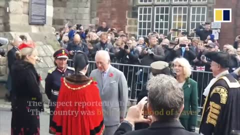 King Charles narrowly avoids being hit by eggs thrown at him during public meeting