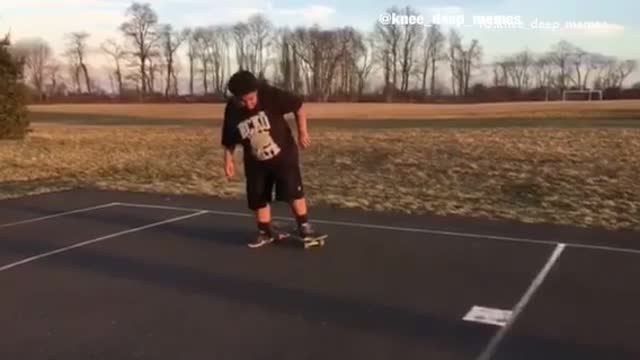 Big guy with afro tries to ride skateboard and does a split