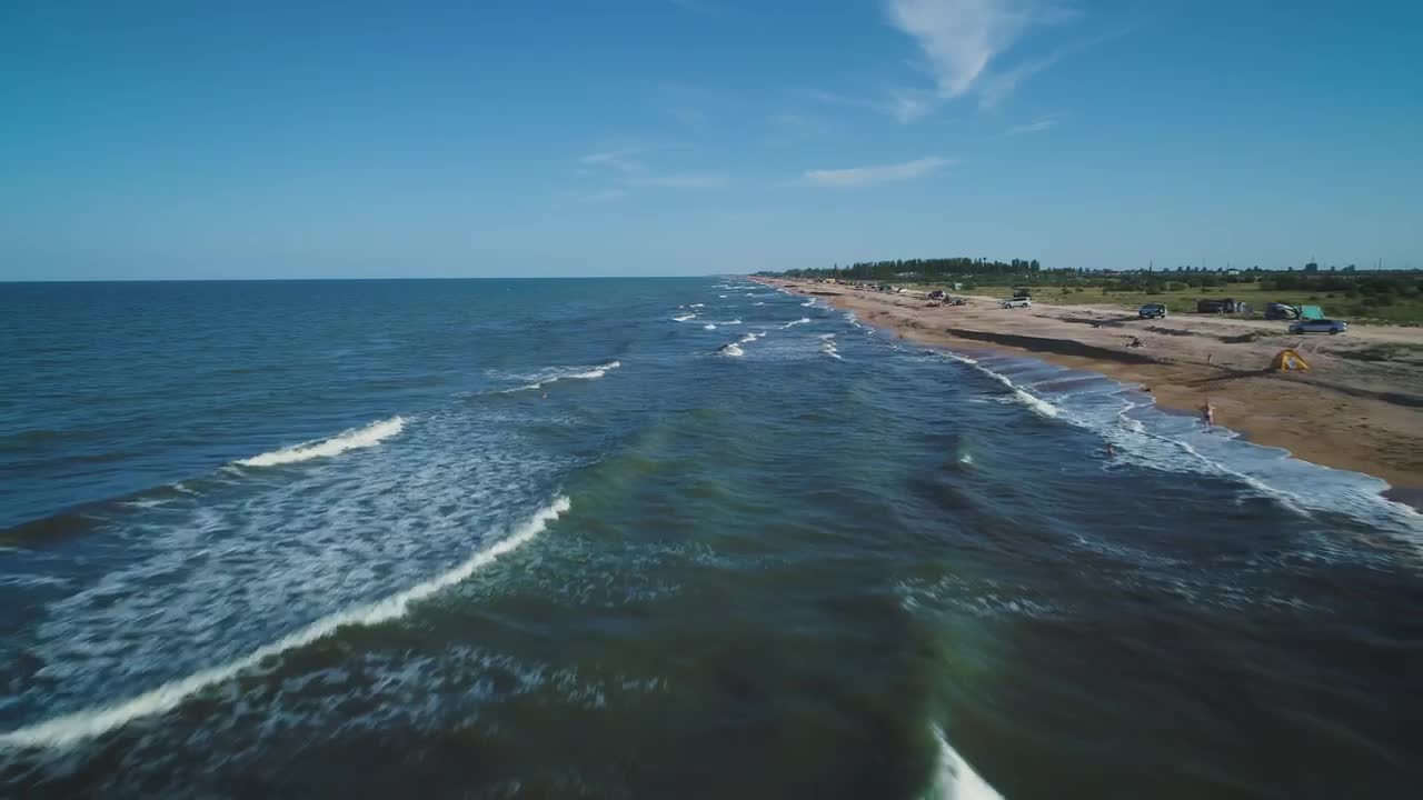 Sea waves reaching the beach in the seashore