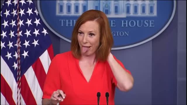 Jen Psaki's reaction to fly on head.