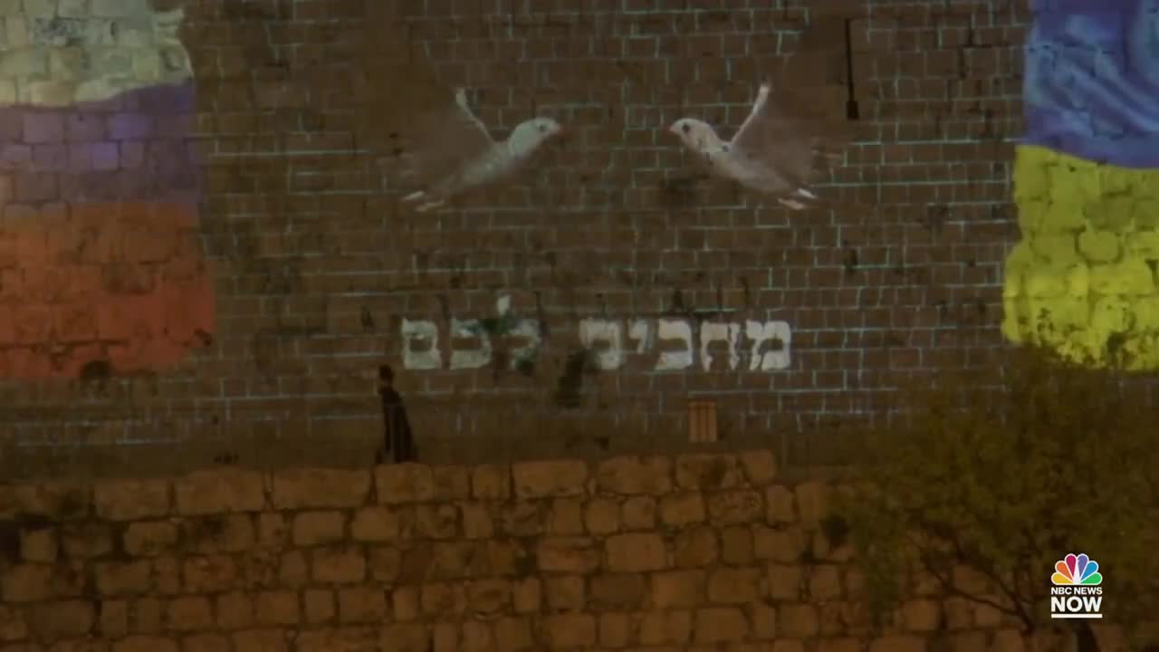 Watch_ Russian And Ukrainian Flags Projected Onto Jerusalem's Old City Walls
