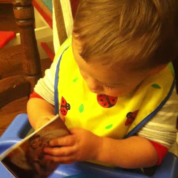 Toddler Holds Cut-out Of Underwear Model And Screams, "Boobies!"