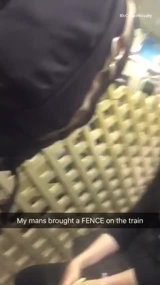My mans brought a fence on the train guy green shirt