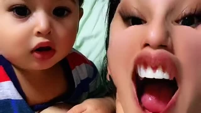 A beautiful child with his mother