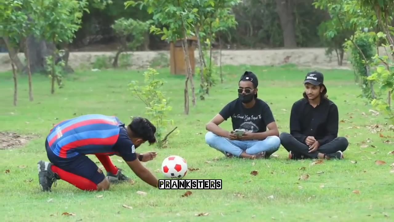 Fake football prank on strangers