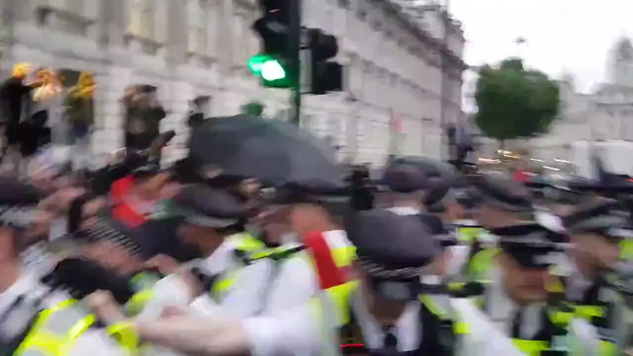 British police in London forced to flee by Islamic mob.