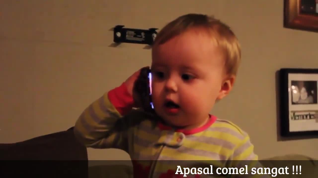 funny baby makes a call