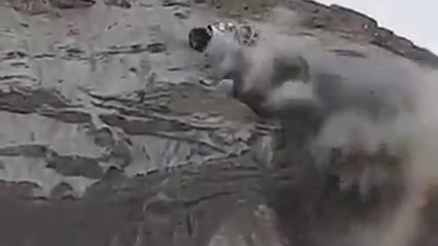 A car that manages to climb a sandy hill
