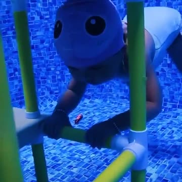 Baby learns how to swim