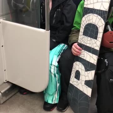 Ride snowboard guys riding on subway