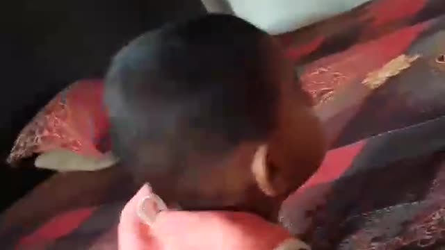 Baby's first laying down from the bed