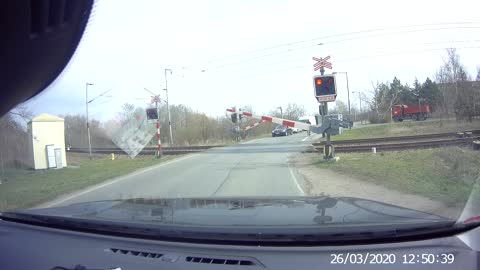 Impatient Bicycle Rider Almost Hit by Train