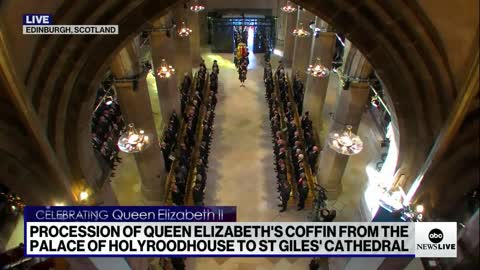 King Charles III leads the processional for the queen into St. Giles’ Cathedral