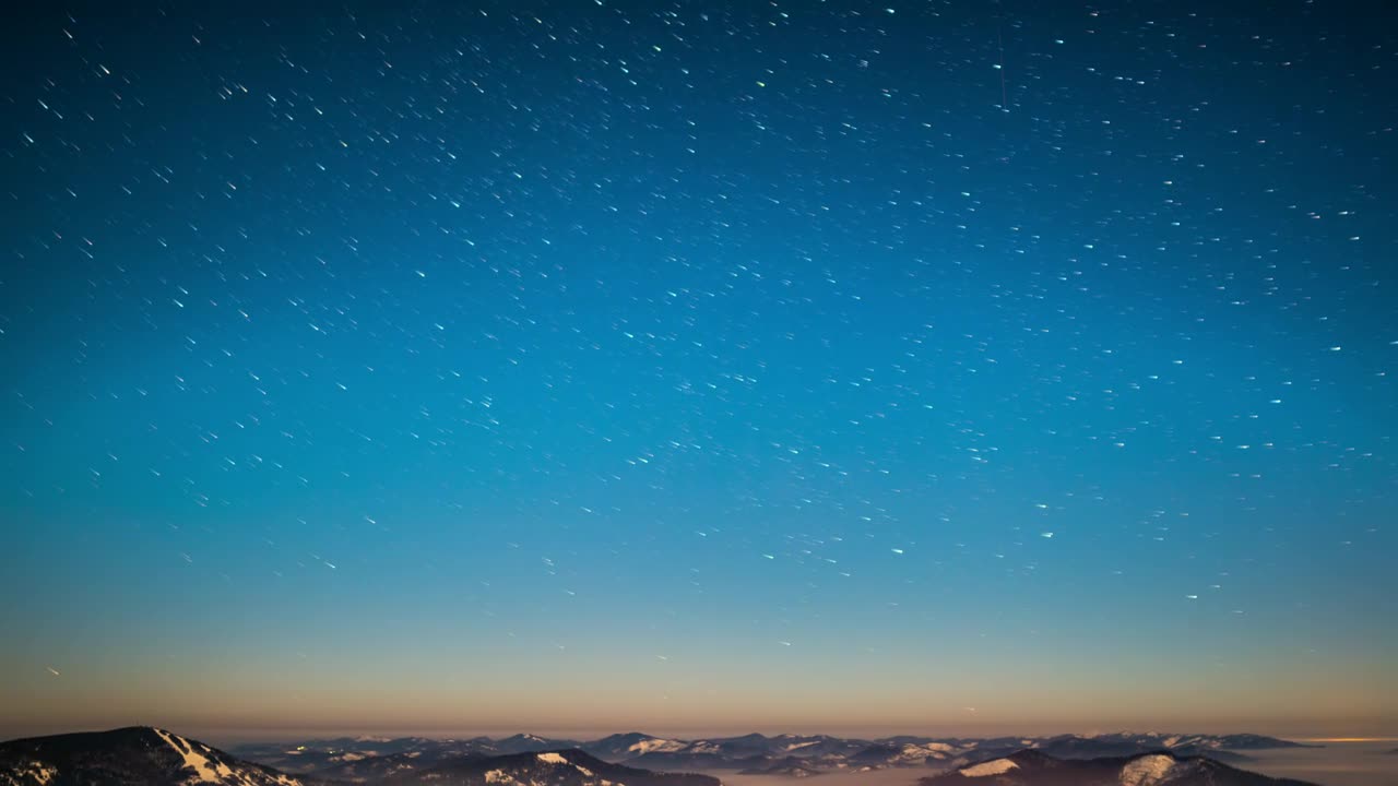 Blue starry sky in the mountains