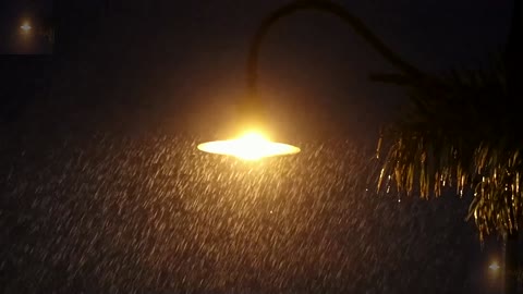 A rainy street lamp